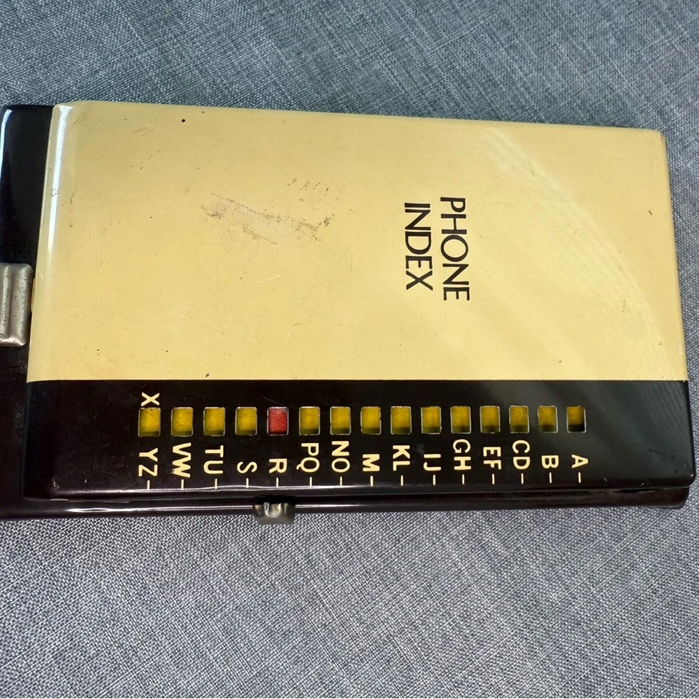 Source Unknown Yellow and Black Phone Index
